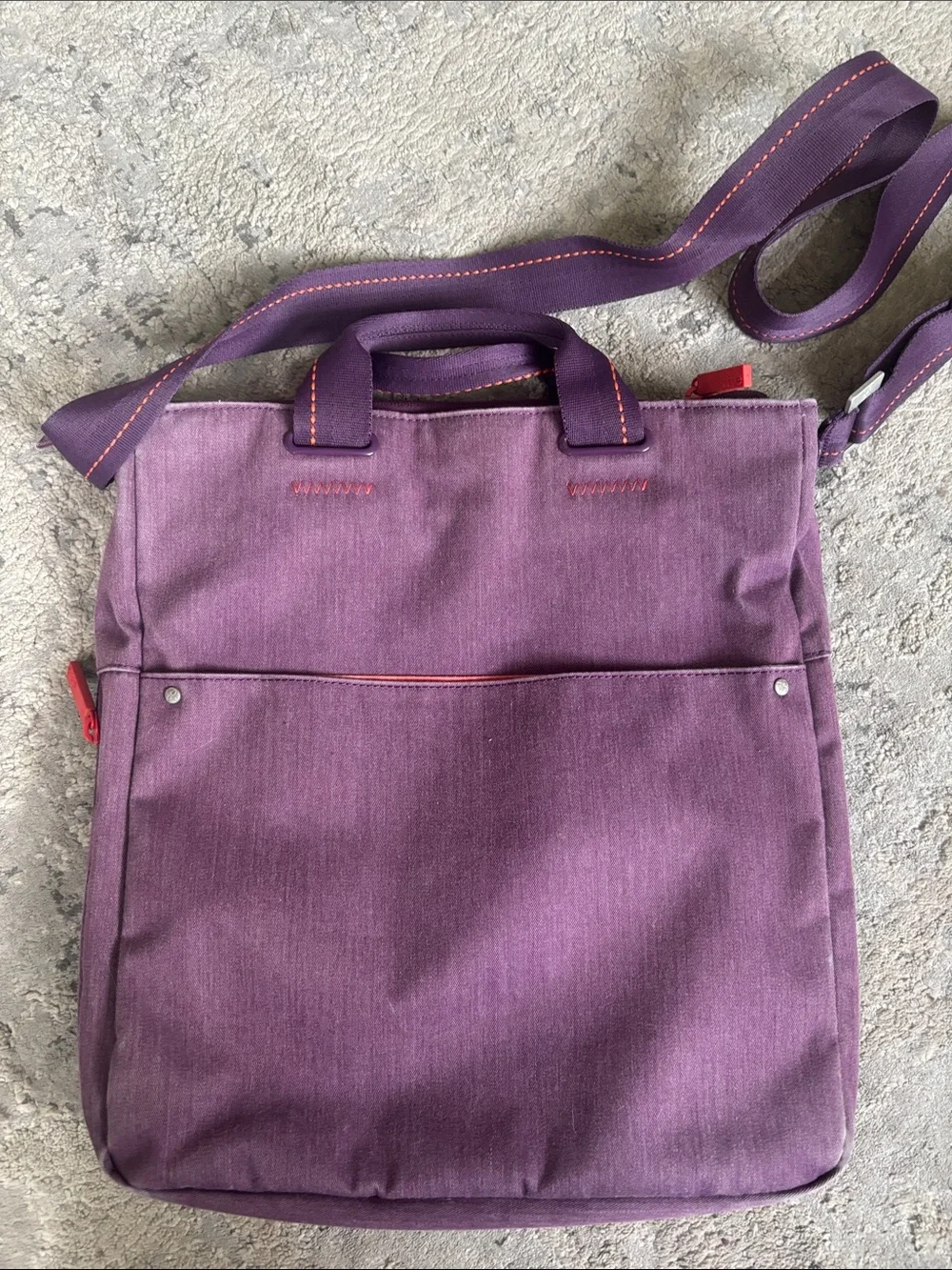 Sherpani purple messenger bag with red trim